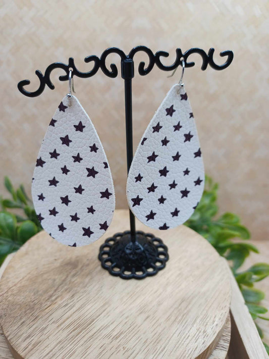 White Leather Style Earrings w/ Black Stars