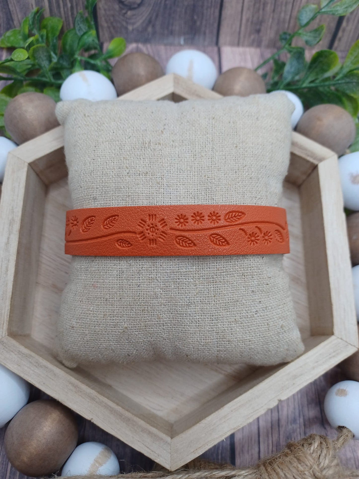 Orange Snap Style Bracelet w/ Floral Embossed Design