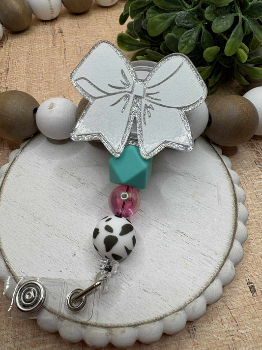 White Bow Beaded Badge Reel - Teal, Pink, Cow