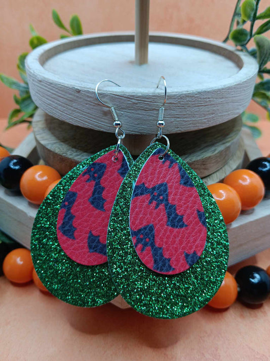 Double Layered Green Glitter w/ Bat Design Leather Style Earrings
