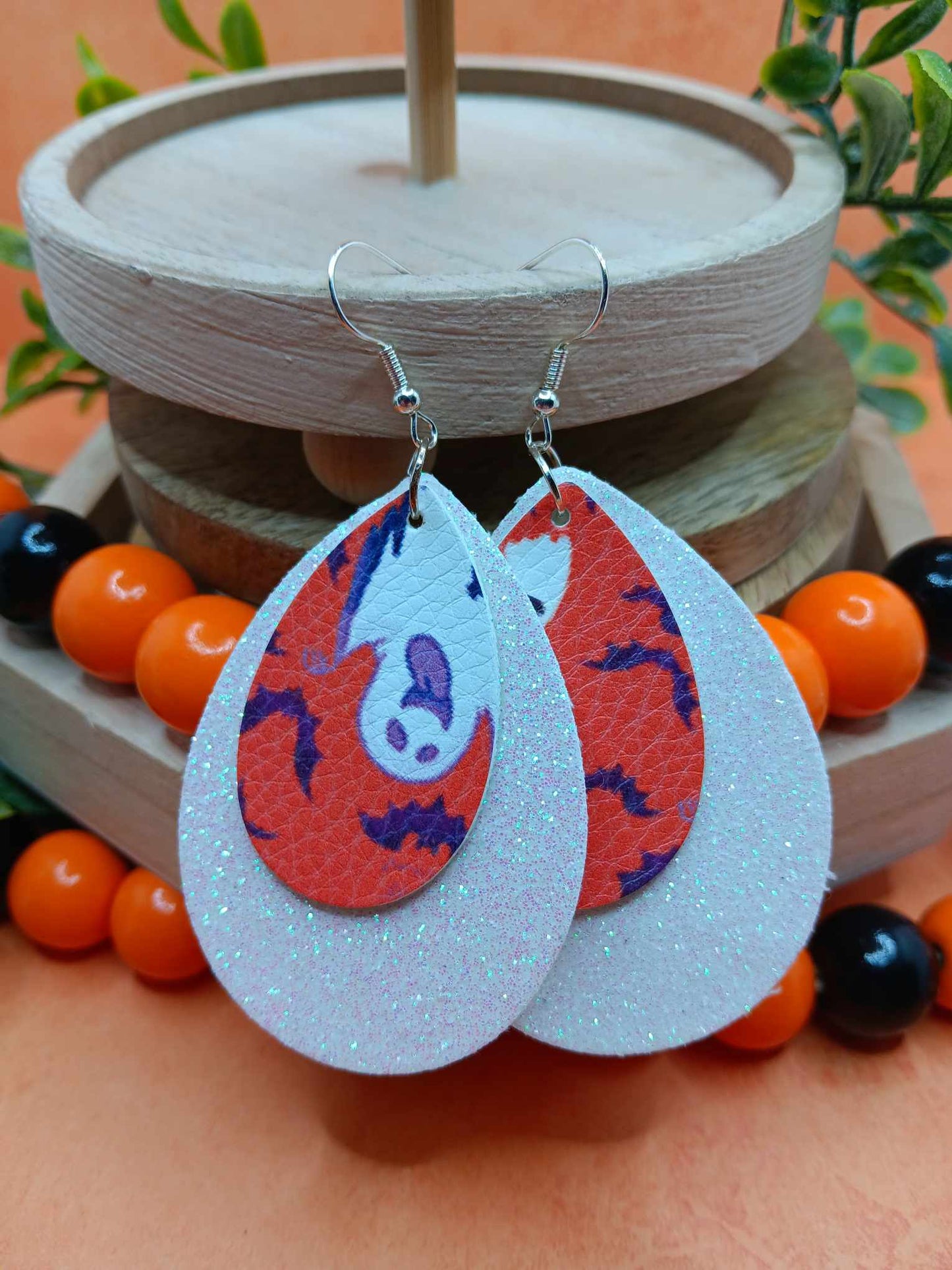 Double Layered White Glitter w/ Ghost Design Leather Style Earrings