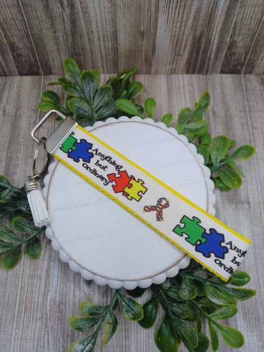 Yellow Anything but Ordinary Puzzle Piece & Ribbon Wristlet Keychain