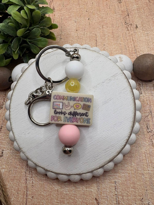 Communication looks different For Everyone Beaded Keychain - White, Yellow, & Pink