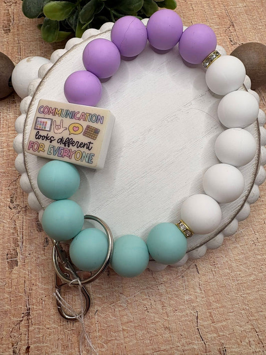 Communication looks different For Everyone Beaded Wristlet - Purple, White, Blue