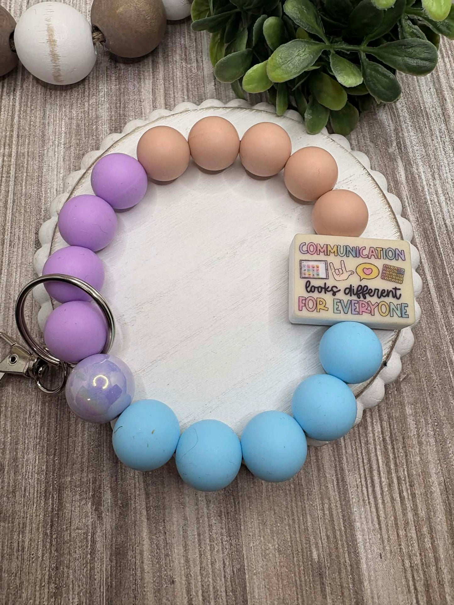 Communication looks different For Everyone Beaded Wristlet - Purple, Blue, Tan