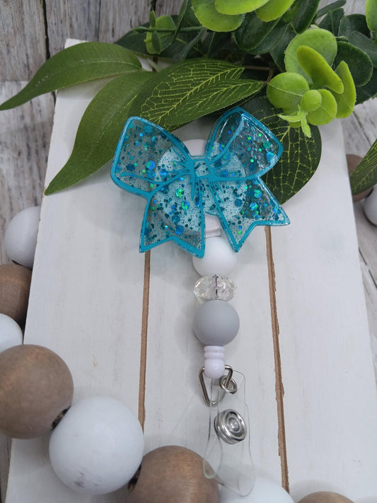 Blue Glitter Bow Beaded Badge Reel