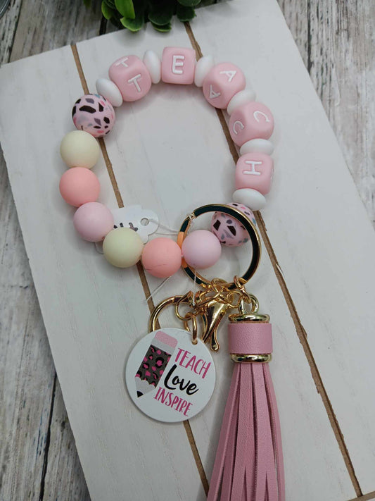 Teach Love Inspire Pink Beaded Wristlet Keychain