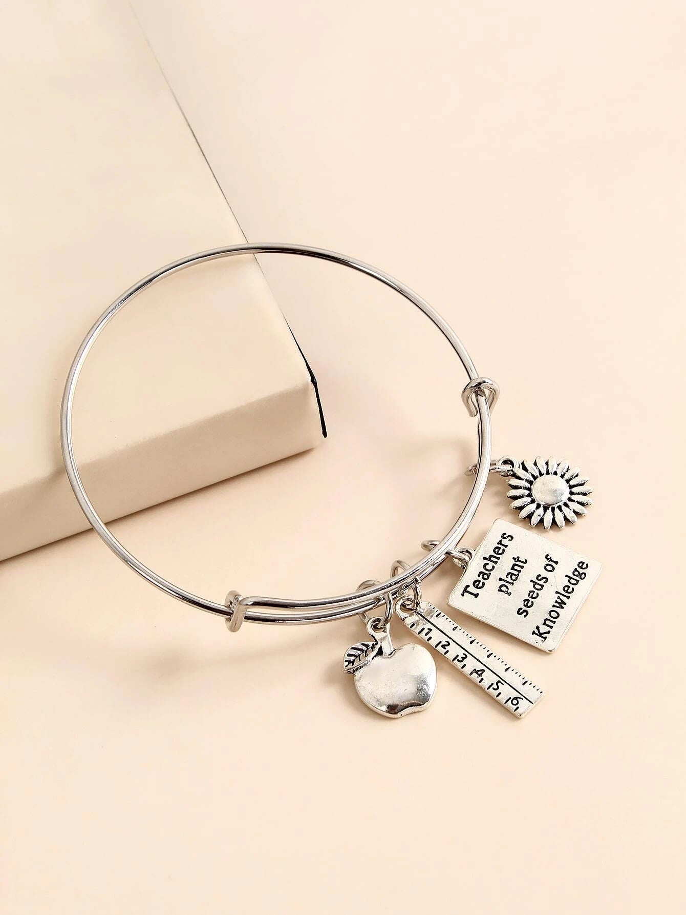 Silver Bracelet w/ Ruler, Apple, & Seed of Knowledge Message