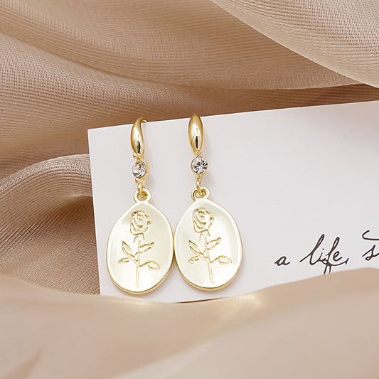Gold Rounded Rose Imprinted Earrings