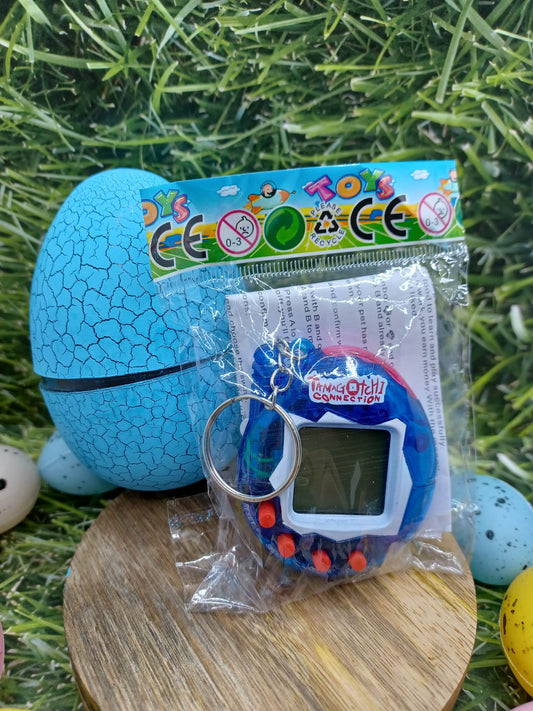 Blue Handheld Pet on a Keyring in an Egg