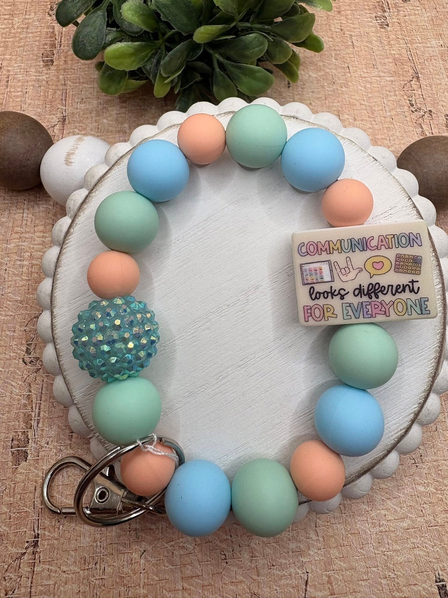 Communication looks different For Everyone Beaded Wristlet - Tan, Teal, Blue
