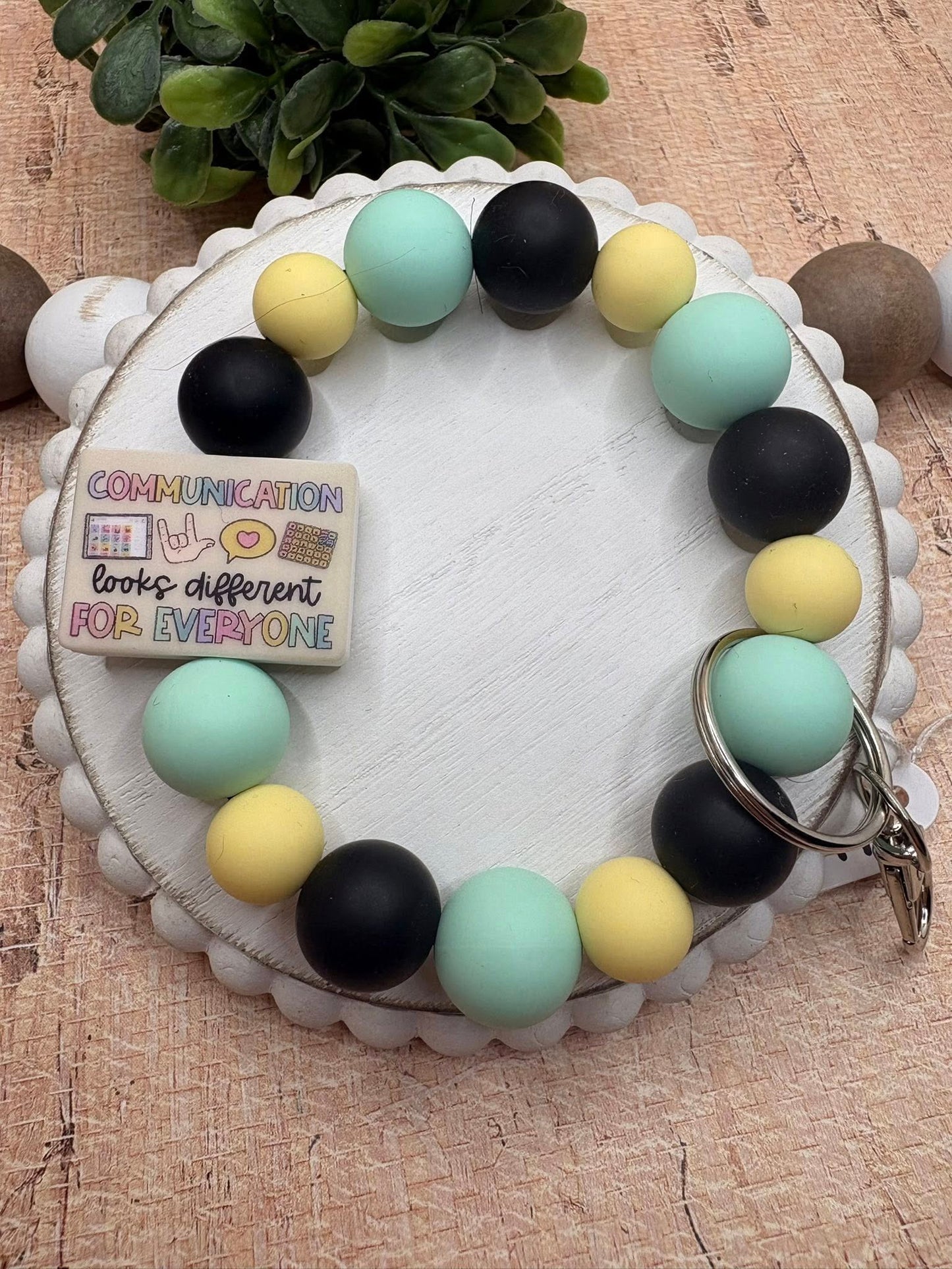Communication looks different For Everyone Beaded Wristlet - Teal, Yellow, Black