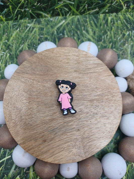 Girl Wearing a Pink Shirt Shoe Charm Accessory