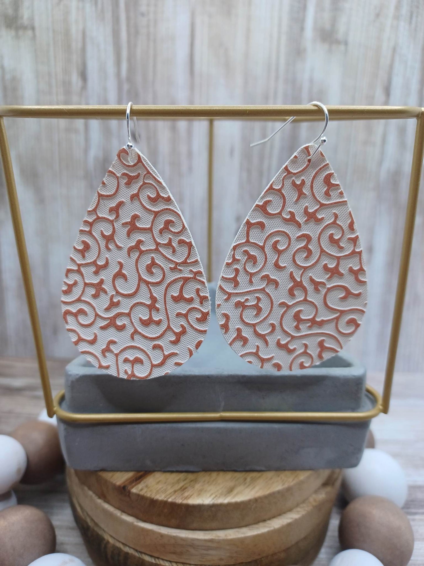 White Whimsical Leather Style Embossed Earrings