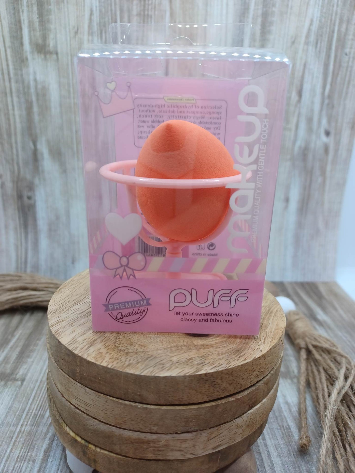 Orange Beauty Blender in a Heart Stand
