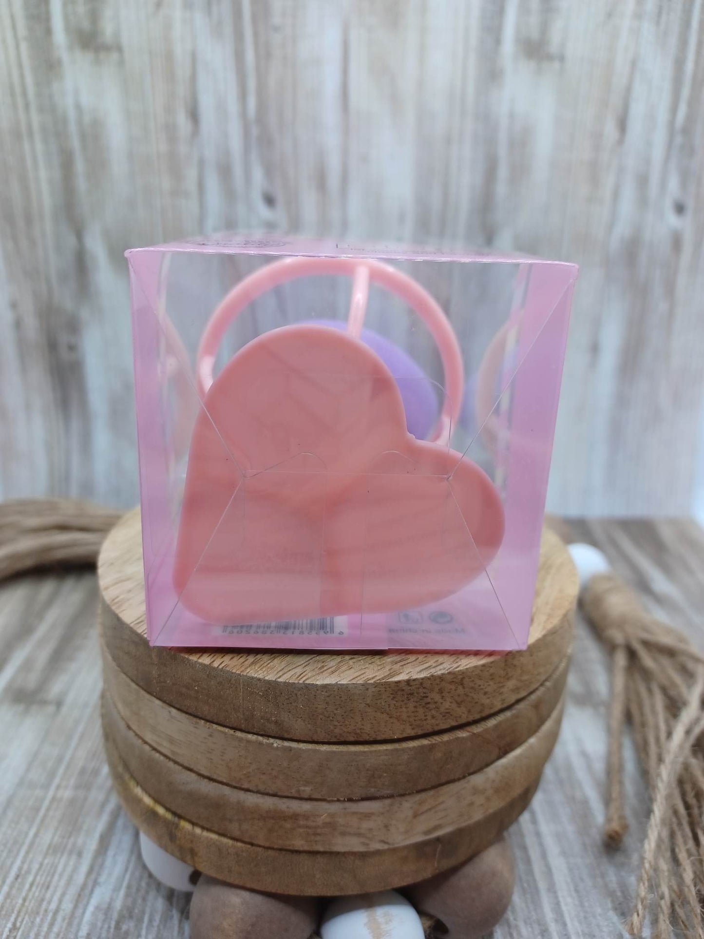 Purple Beauty Blender in a Heart Stand